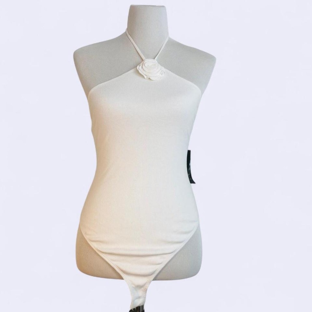 White halter‎ neck bodysuit with rose detail